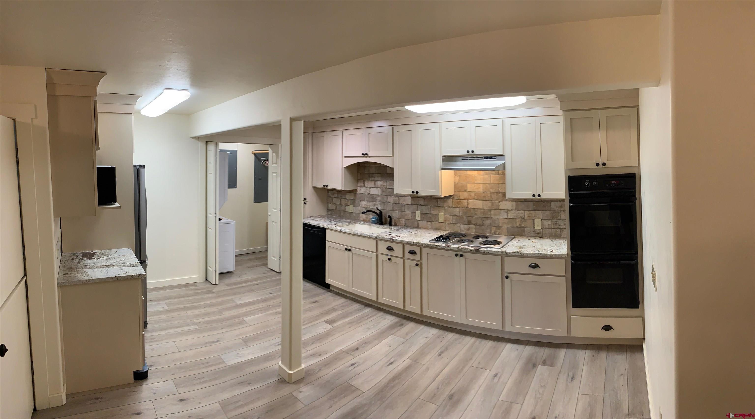 15967 Bull Mesa Road Cedaredge, CO 81413 - Photo 27 of 32 Lower Apartment Kitchen