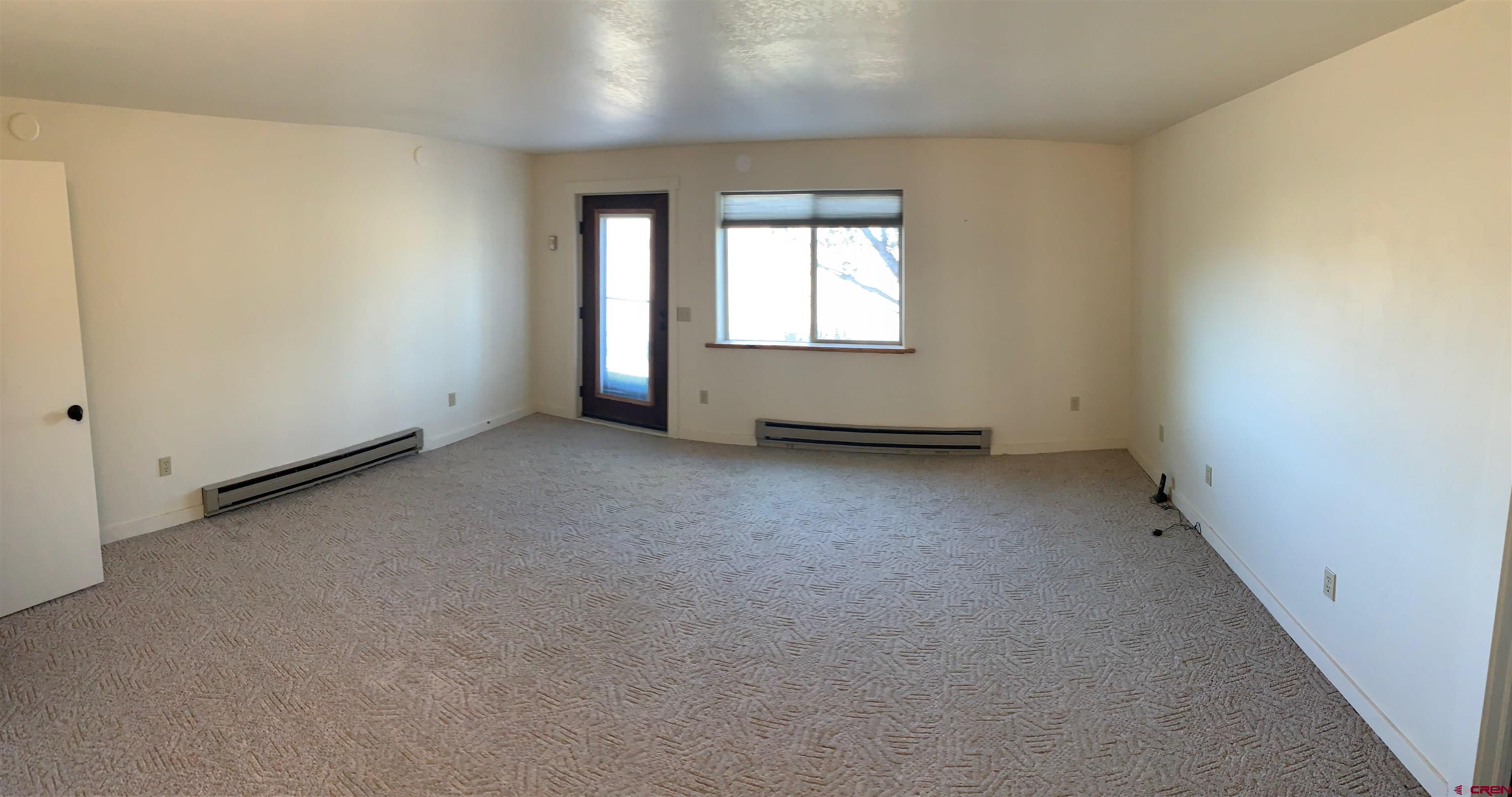 15967 Bull Mesa Road Cedaredge, CO 81413 - Photo 29 of 32 Lower Apartment Bedroom 1