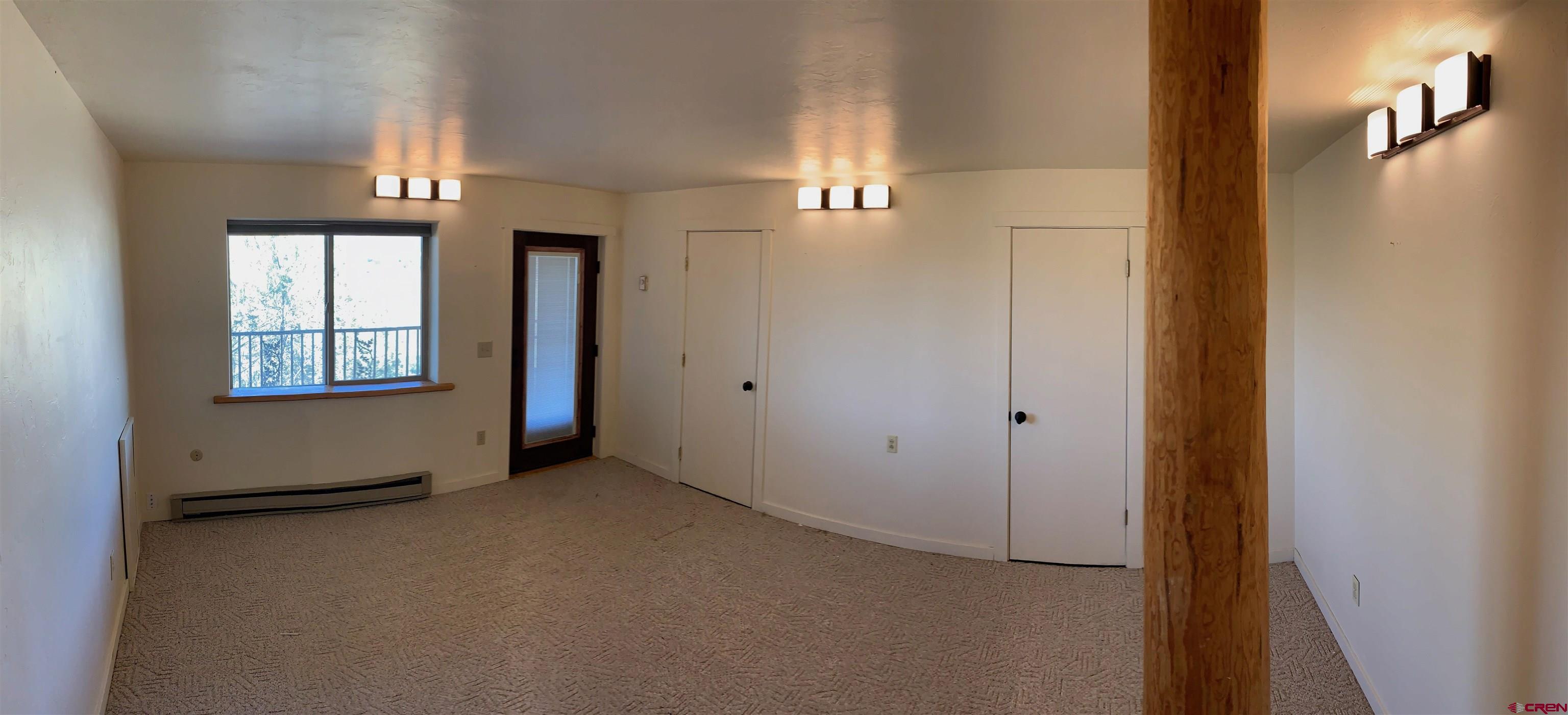 15967 Bull Mesa Road Cedaredge, CO 81413 - Photo 30 of 32 Lower Apartment Bedroom 2