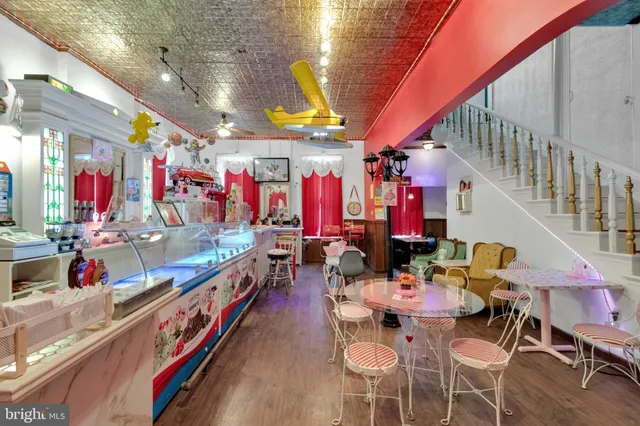 a kitchen with stainless steel appliances a stove a sink dishwasher and cabinets