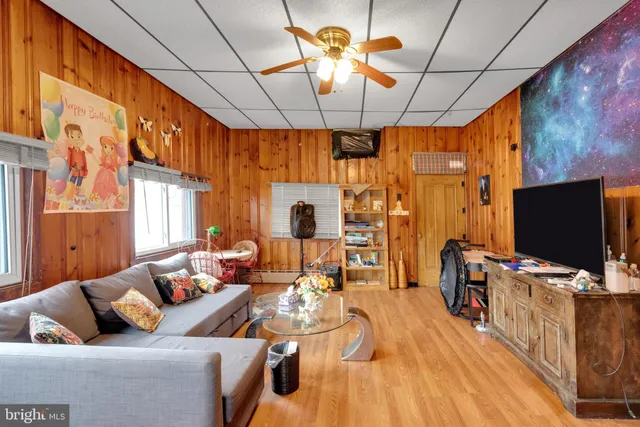 an aerial view of a house with a garden