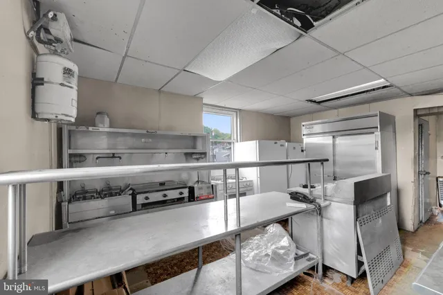 a aerial view of a house with a garden