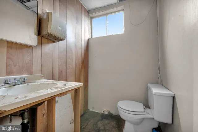 a view of a two chairs in the balcony