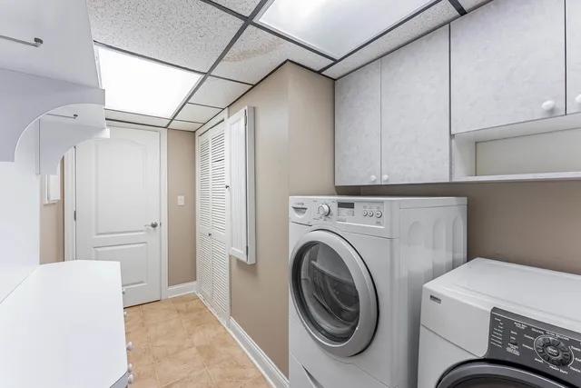a view of livingroom with washer and dryer
