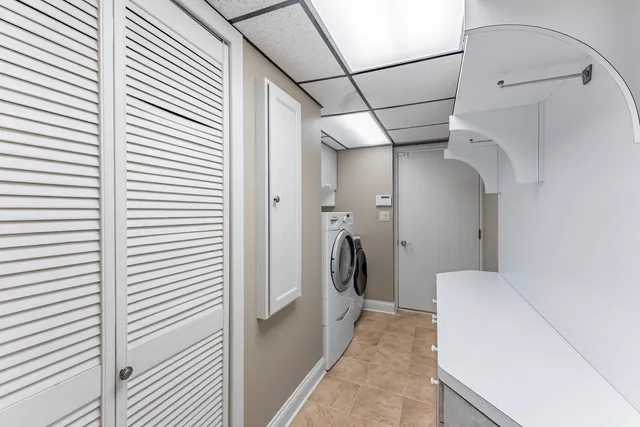 a view of a room with a washer and dryer