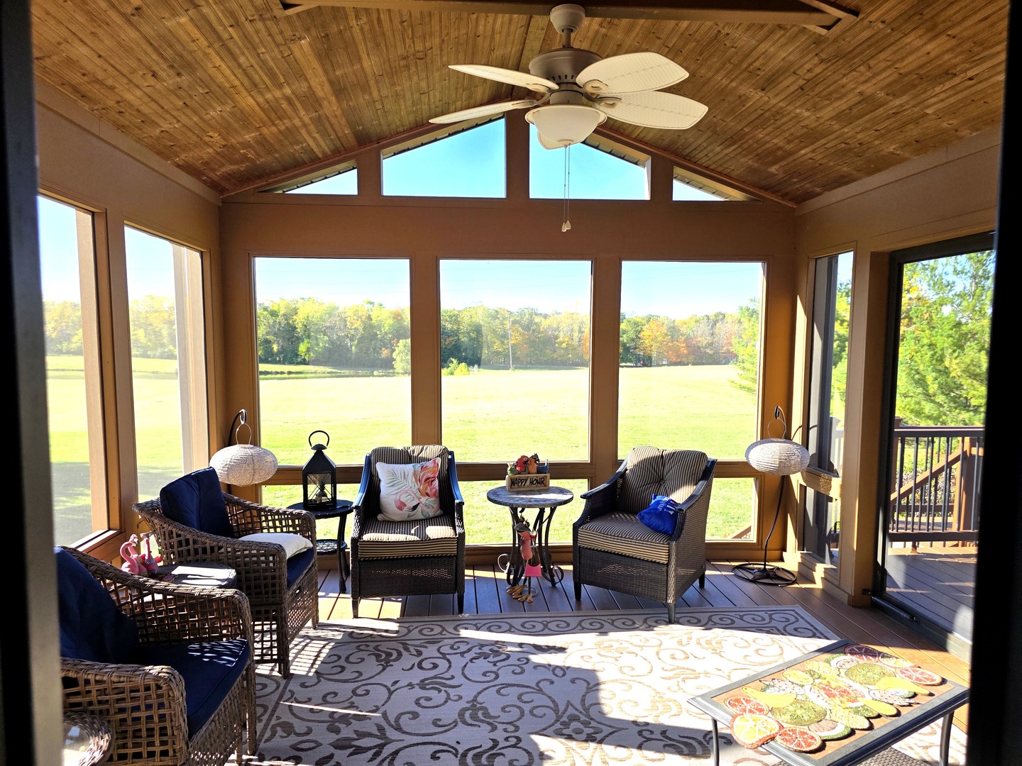 9667 Crossbow Drive Bloomington, IL 61705 - Photo 24 of 54 a living room with furniture and floor to ceiling windows