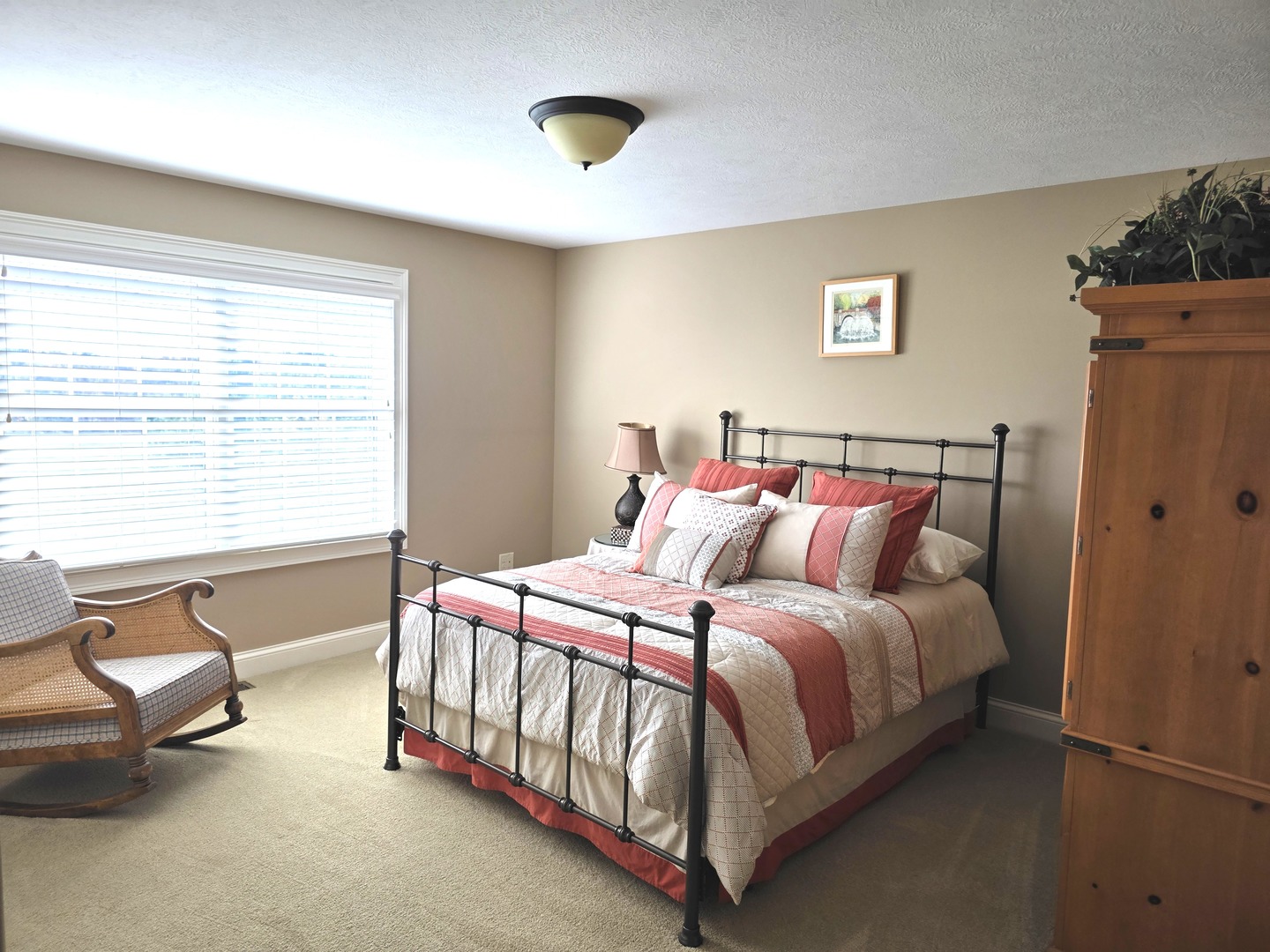 9667 Crossbow Drive Bloomington, IL 61705 - Photo 36 of 54 a bedroom with a bed and a couch