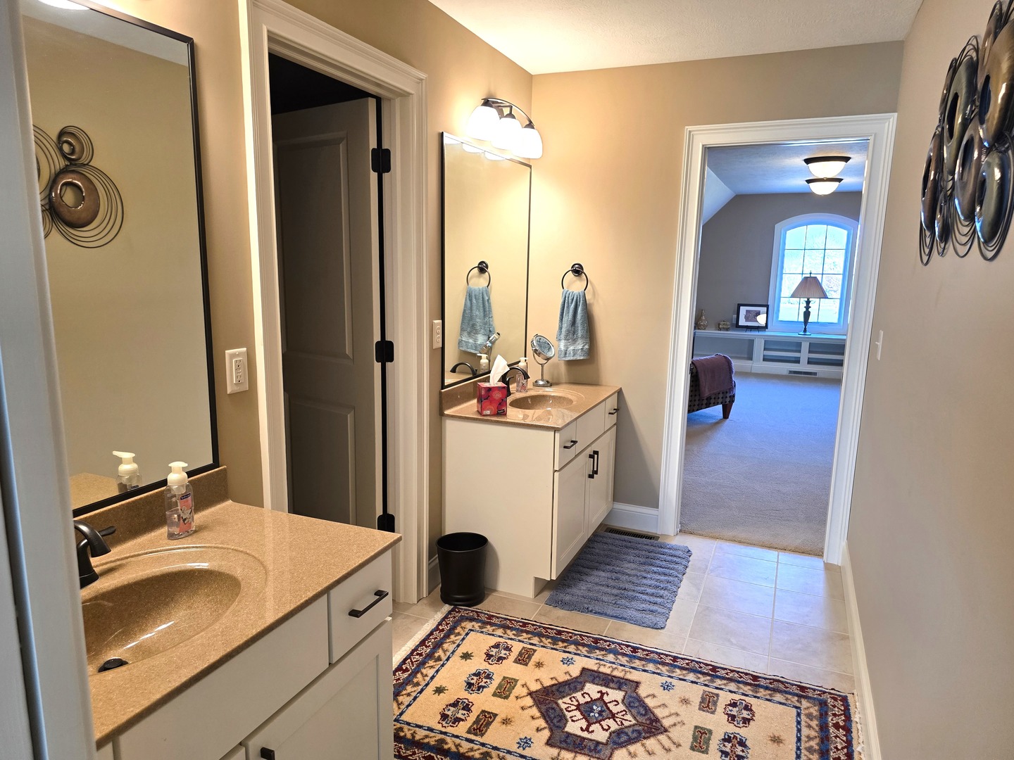 9667 Crossbow Drive Bloomington, IL 61705 - Photo 39 of 54 a bathroom with a sink double vanity