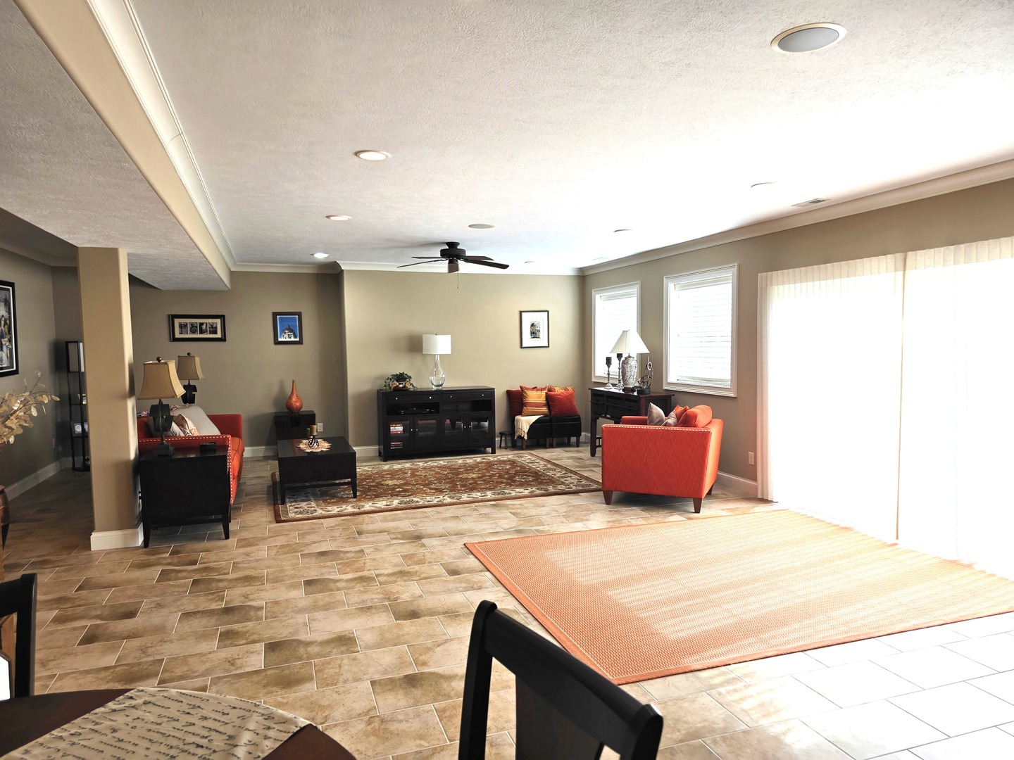 9667 Crossbow Drive Bloomington, IL 61705 - Photo 49 of 54 a spacious bedroom with a bed a dresser and large mirror