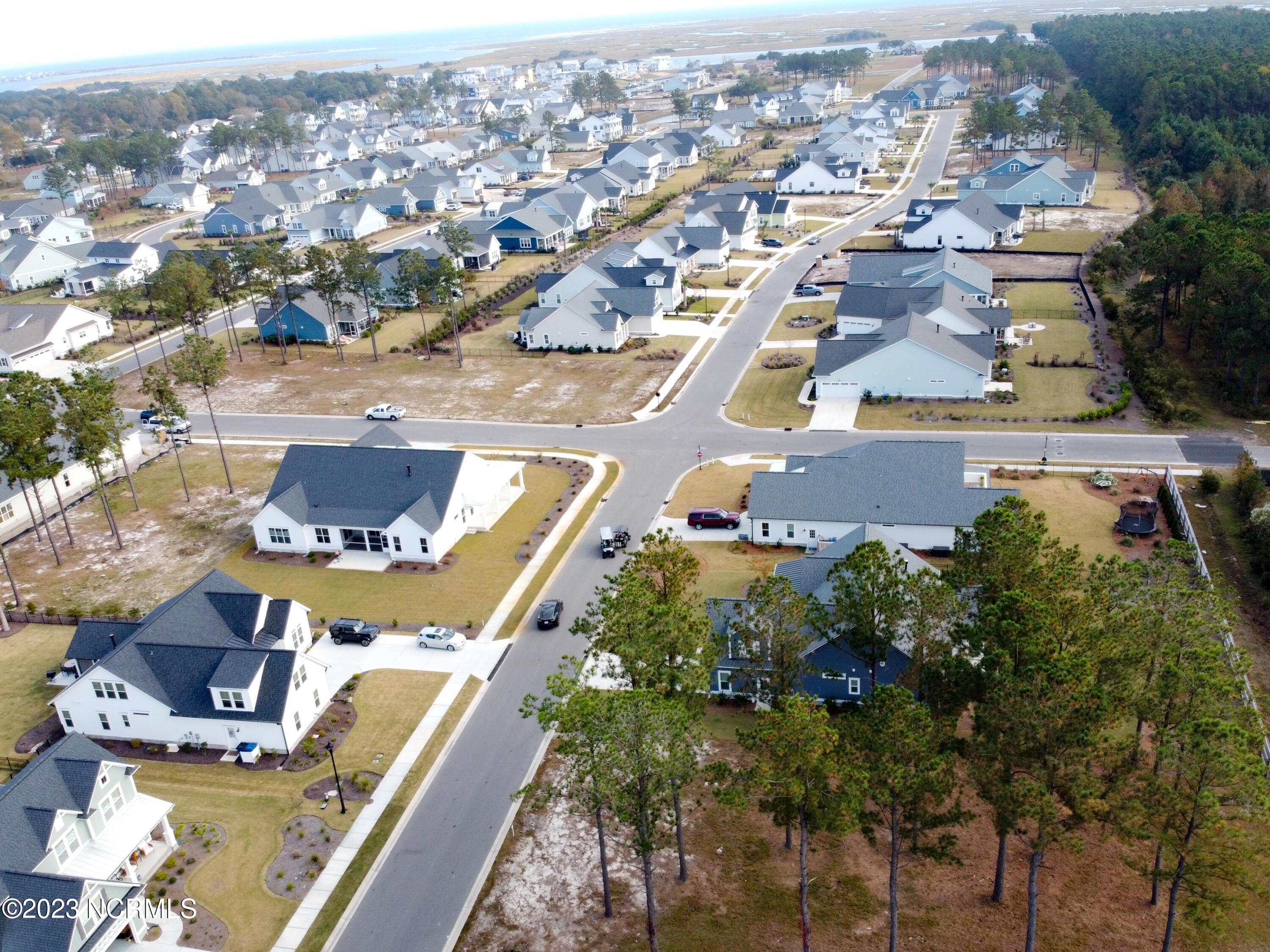 326 Jackline Drive Hampstead, NC 28443 - Photo 2 of 11 View of neighborhood looking towards the water. Lot is located lower right of photo.