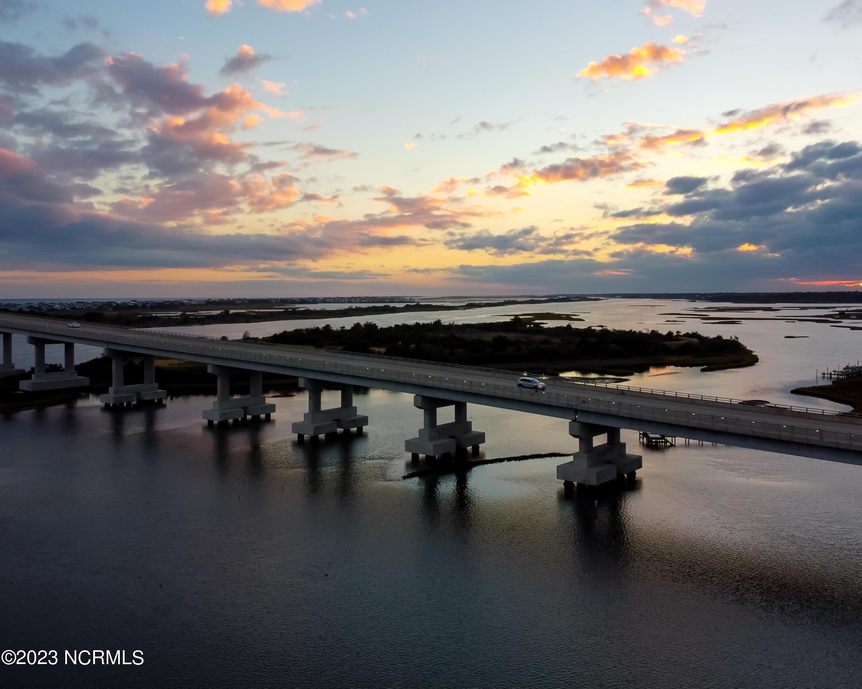 326 Jackline Drive Hampstead, NC 28443 - Photo 9 of 11 The bridge to Topsail Island and a gorgeous Carolina sunset