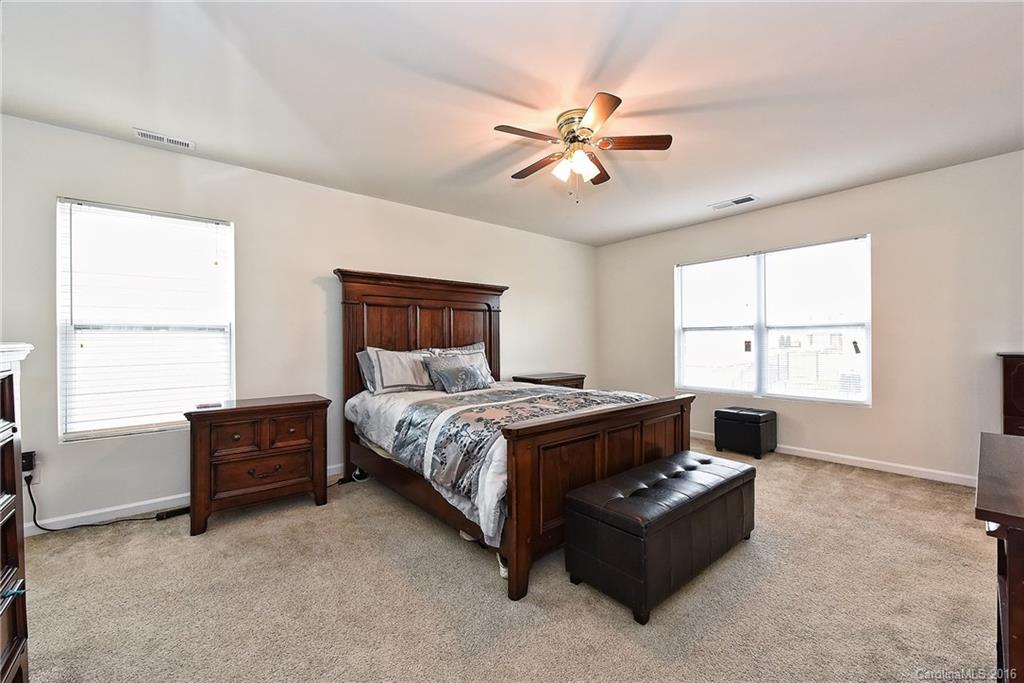 1025 Skillbeck Road Indian Trail, NC 28079 - Photo 15 of 24 a bedroom with a bed and window