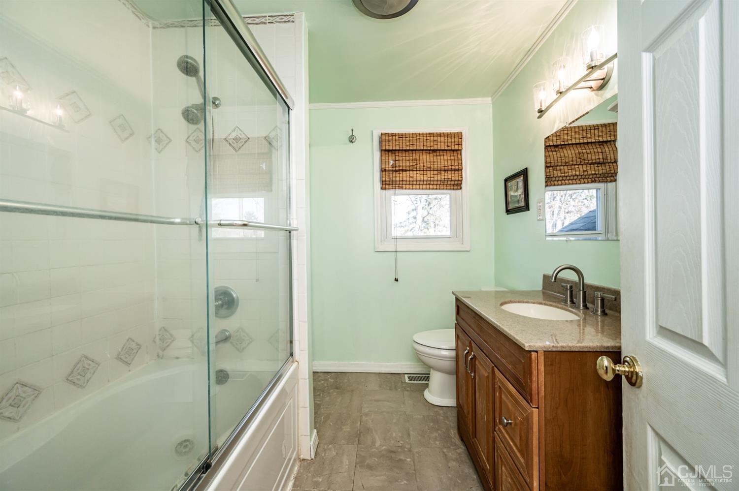 107 Estates Road Clementon, NJ 08021 - Photo 14 of 31 a bathroom with a sink a toilet and shower