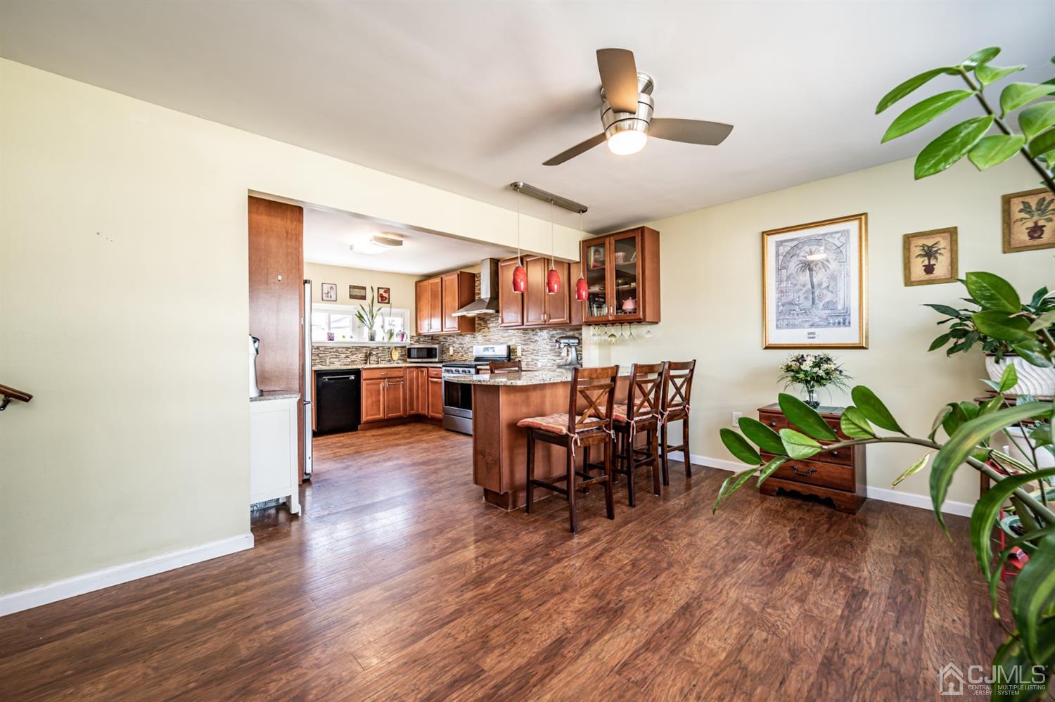 107 Estates Road Clementon, NJ 08021 - Photo 3 of 31 a living room with furniture and a wooden floor