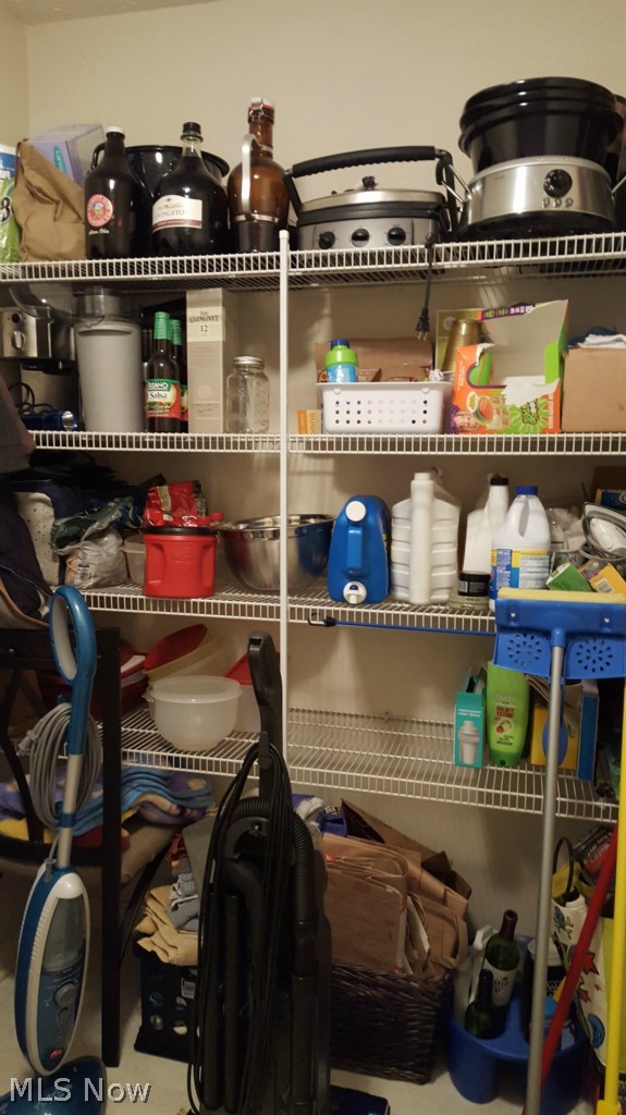 2332 Ravenna Road Kent, OH 44240 - Photo 18 of 25 2332 Ravenna Rd, Kent, OH 44240 Plenty of storage on the pantry shelving in the laundry/utility room.
