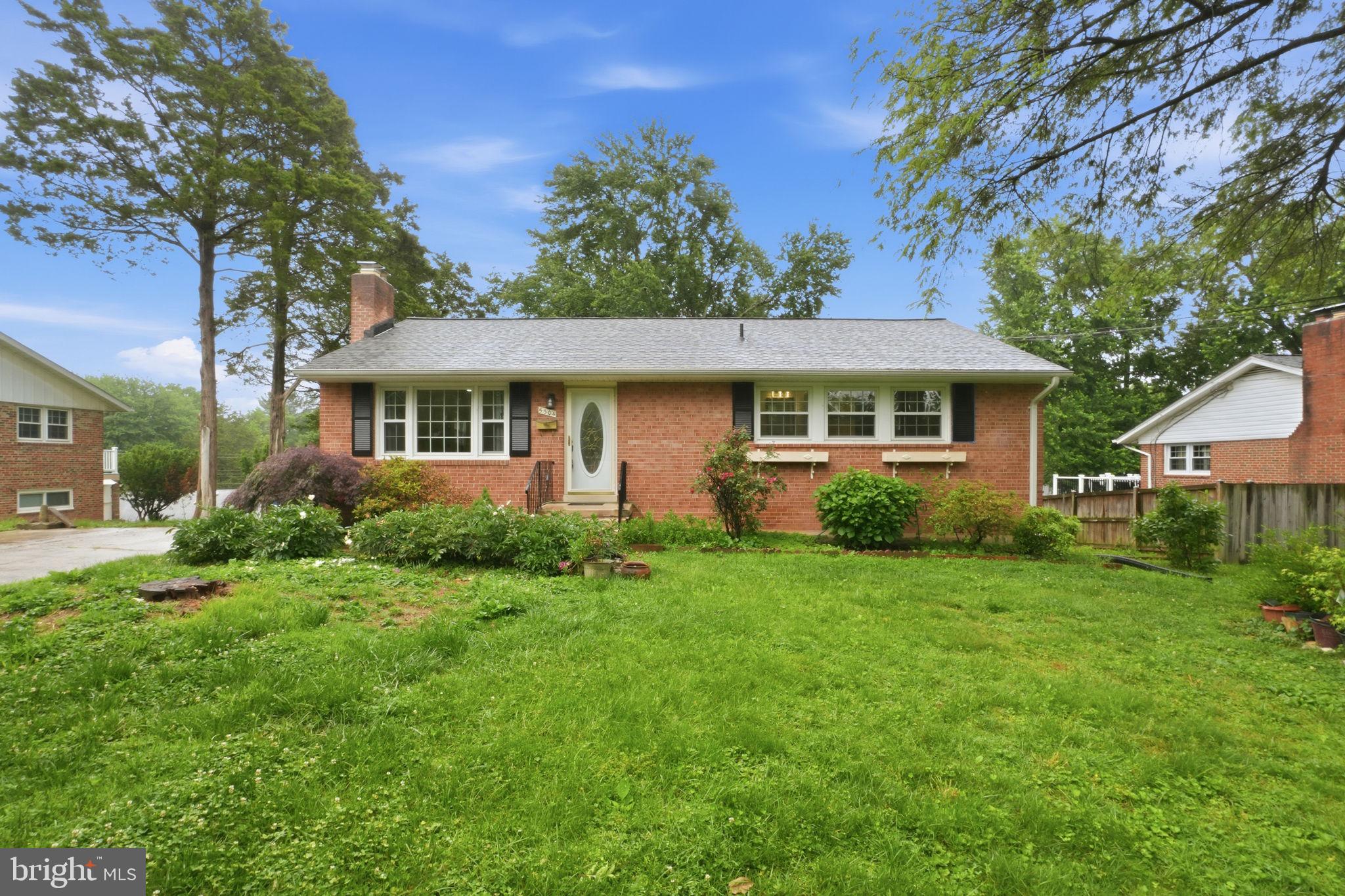5304 Pillow Lane Springfield, VA 22151 - Photo 1 of 32 a view of a house with a yard