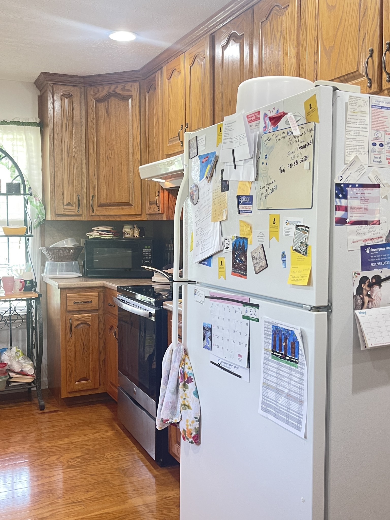 487 North Scenic Road Monteagle, TN 37356 - Photo 12 of 31 a kitchen with a refrigerator and a stove