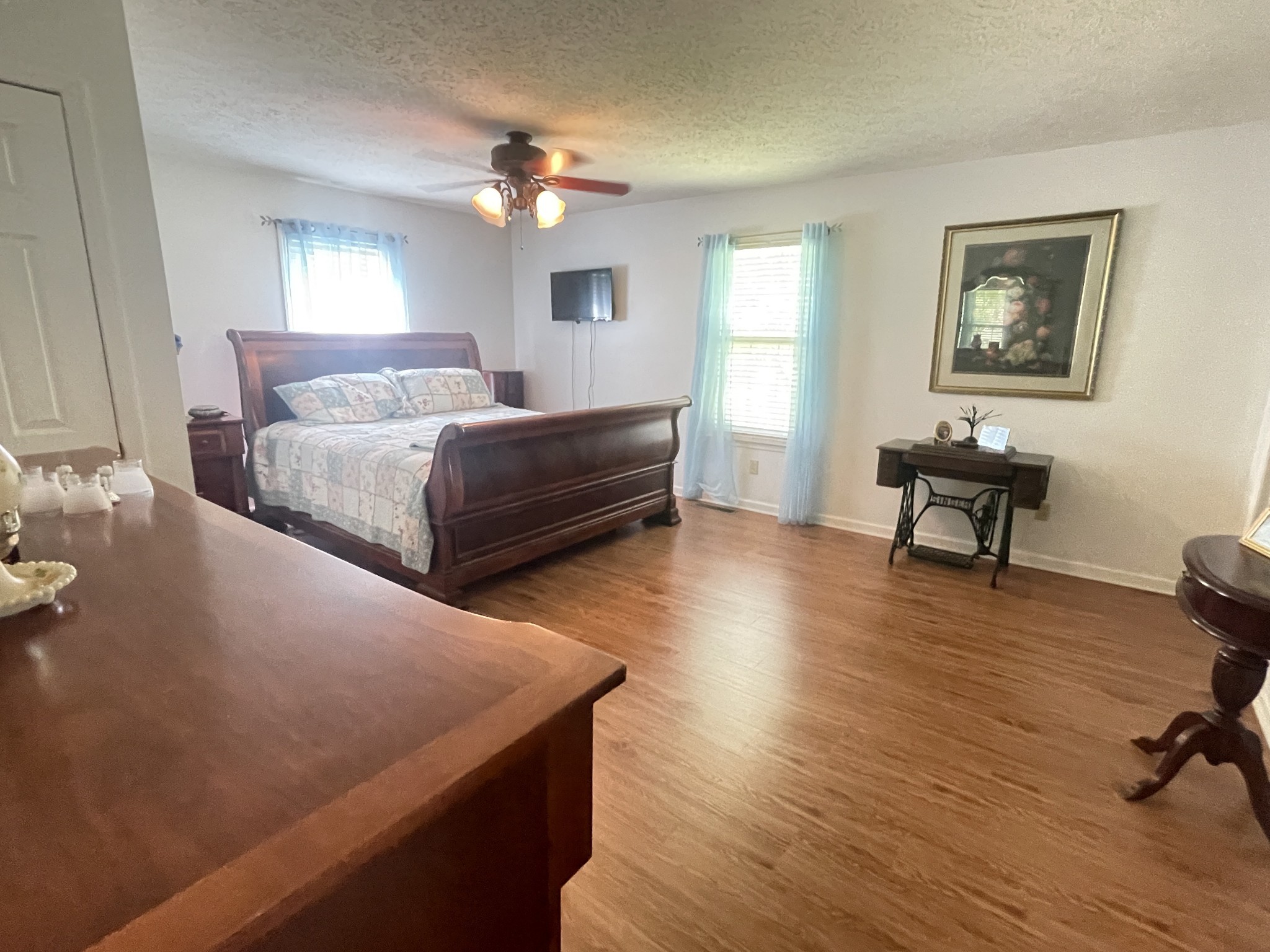 487 North Scenic Road Monteagle, TN 37356 - Photo 18 of 31 a bedroom with a bed and wooden floor