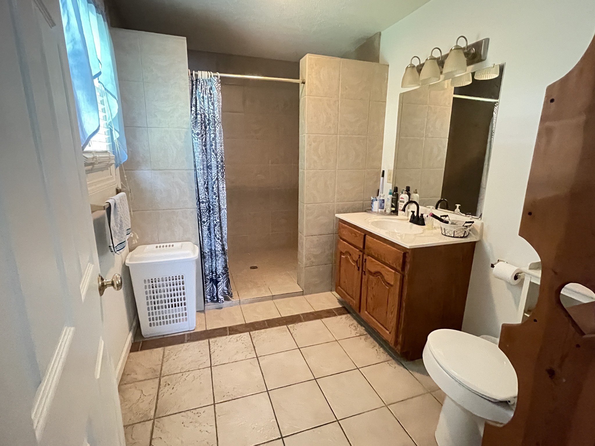 487 North Scenic Road Monteagle, TN 37356 - Photo 20 of 31 a bathroom with a sink toilet and shower