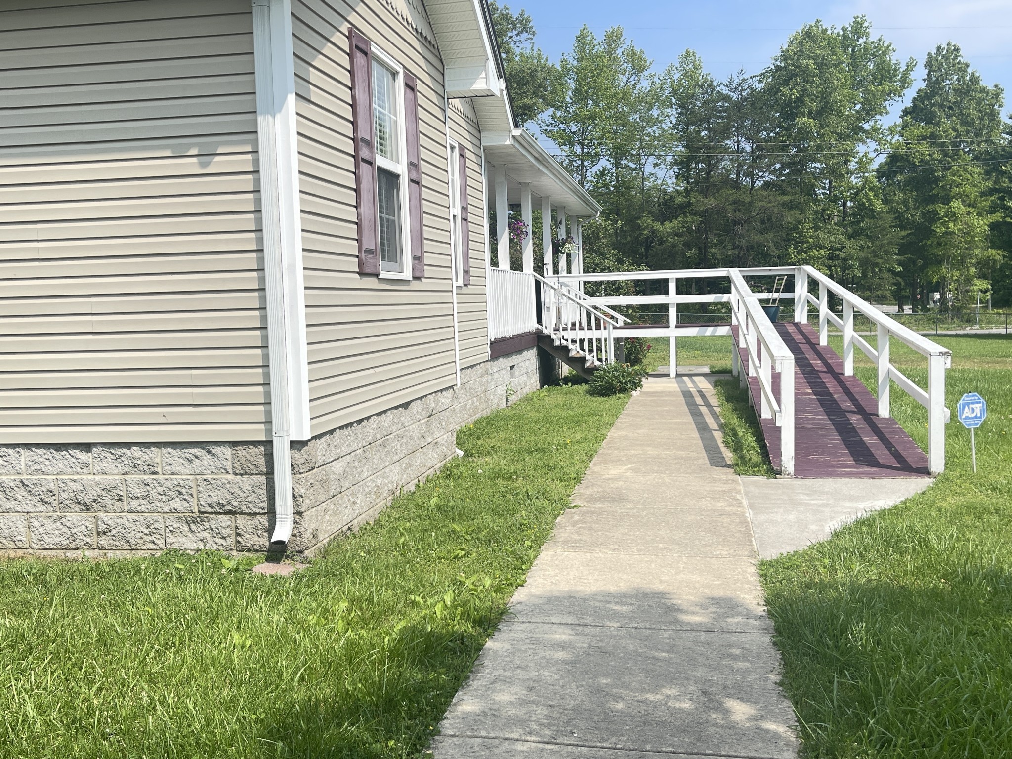 487 North Scenic Road Monteagle, TN 37356 - Photo 2 of 31 a view of house with backyard and garden
