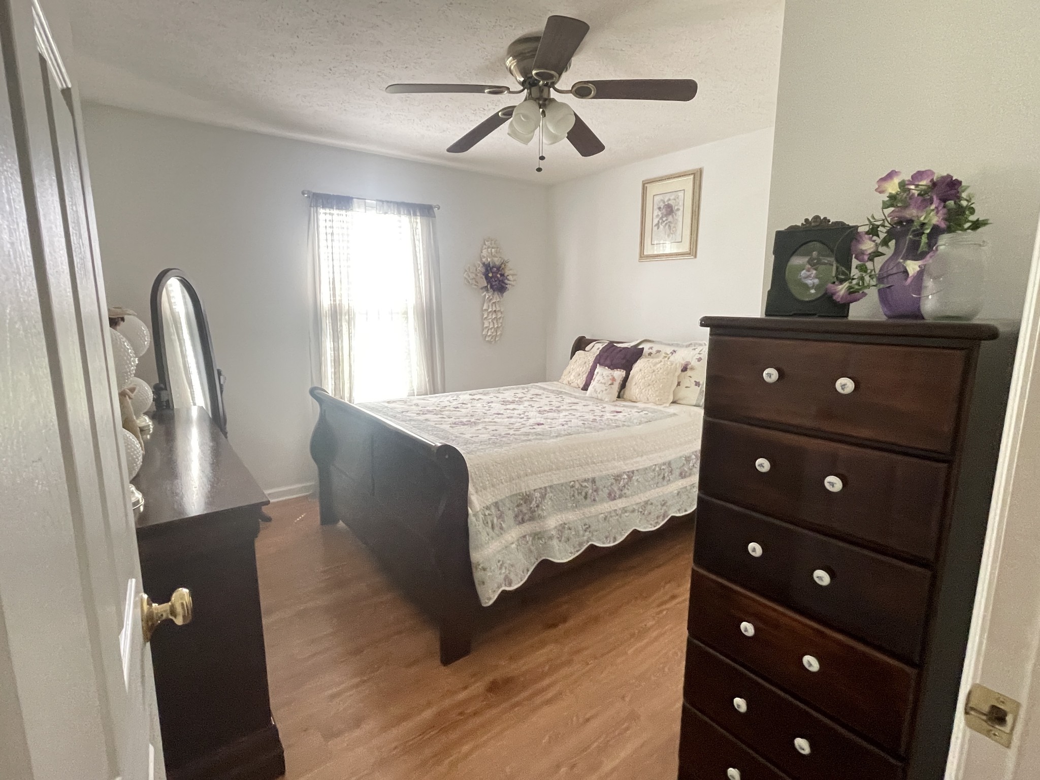 487 North Scenic Road Monteagle, TN 37356 - Photo 22 of 31 a bedroom with a bed dresser and a window
