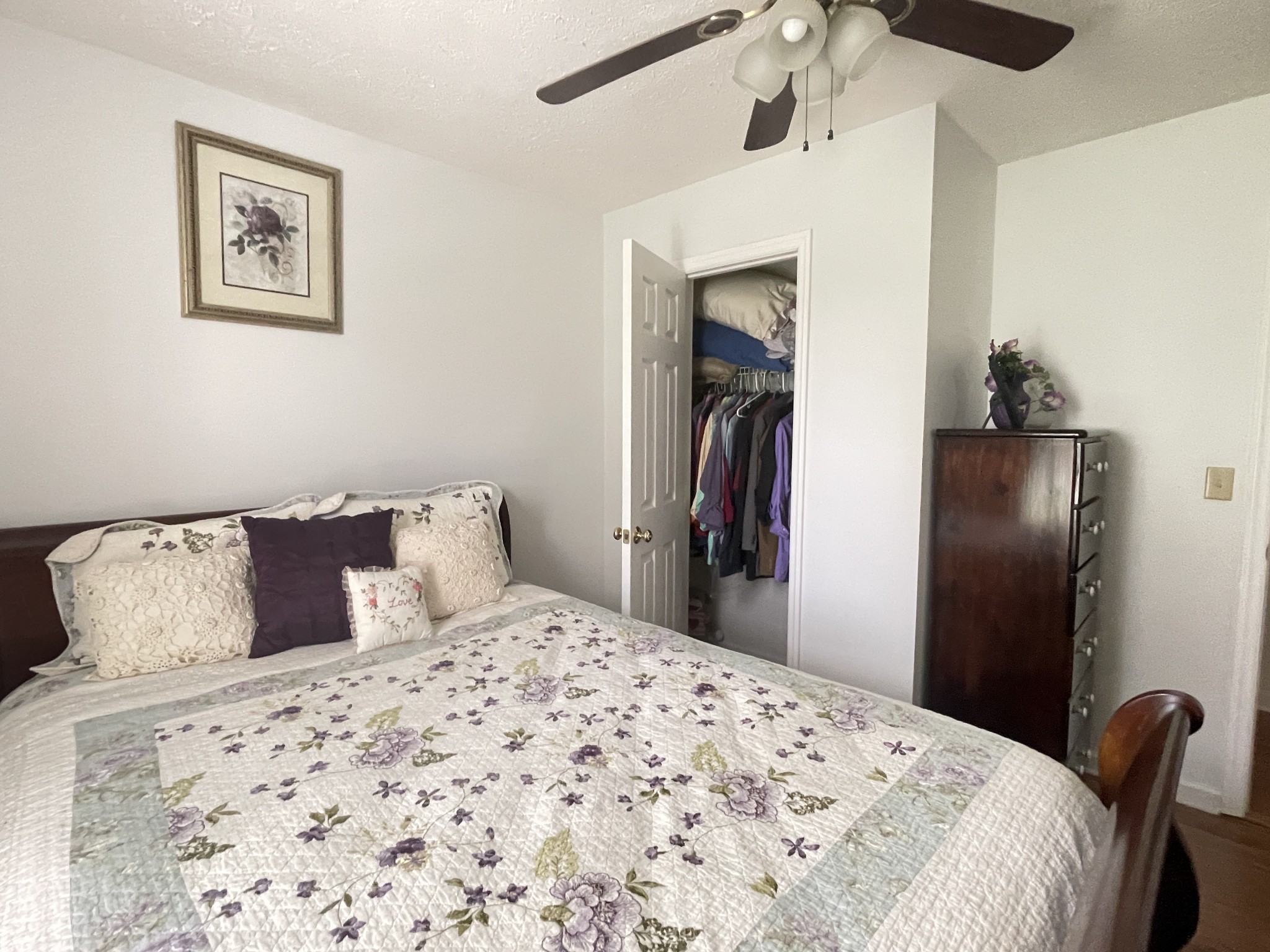 487 North Scenic Road Monteagle, TN 37356 - Photo 23 of 31 a bedroom with a large bed and a chandelier
