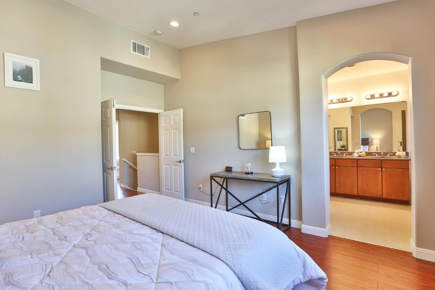1105 Luz Del Sol Tr Loop Milpitas, CA 95035 - Photo 15 of 34 a bedroom with a bed and a view of bathroom