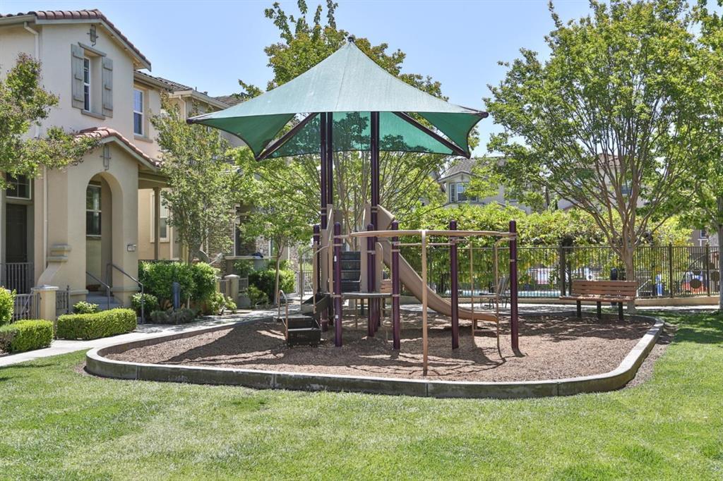 1105 Luz Del Sol Tr Loop Milpitas, CA 95035 - Photo 16 of 34 a view of a house with a yard