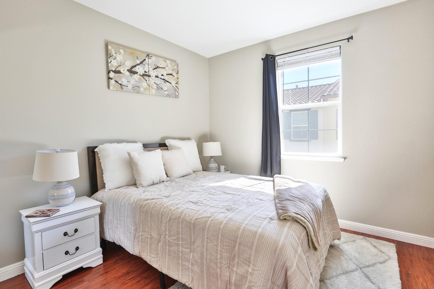 1105 Luz Del Sol Tr Loop Milpitas, CA 95035 - Photo 18 of 34 a bedroom with a bed and a window