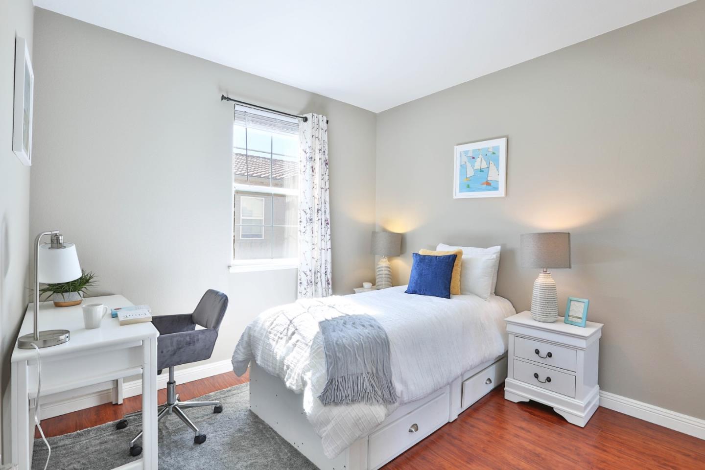 1105 Luz Del Sol Tr Loop Milpitas, CA 95035 - Photo 19 of 34 a bedroom with a bed and a window