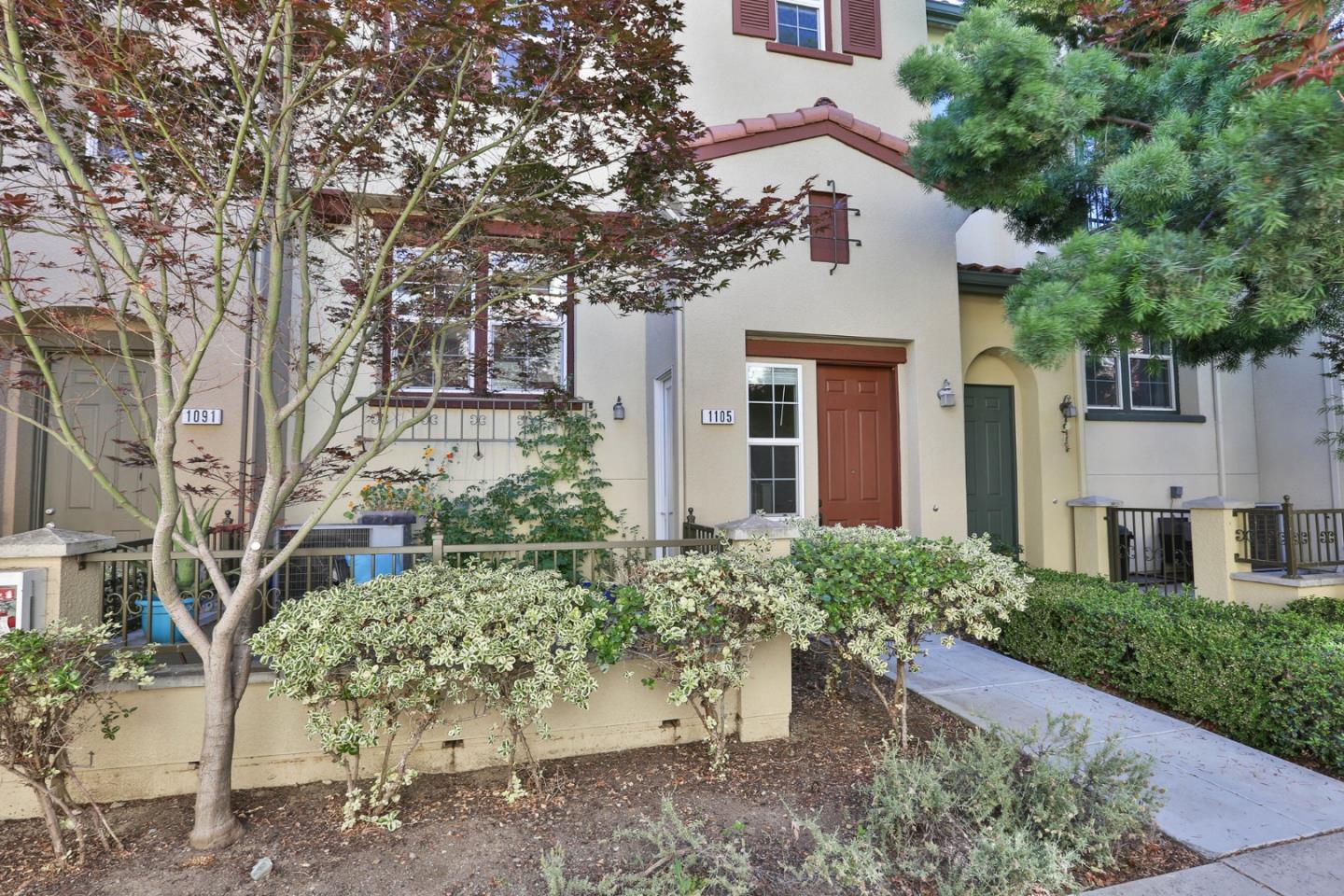 1105 Luz Del Sol Tr Loop Milpitas, CA 95035 - Photo 2 of 34 a front view of a house with a yard
