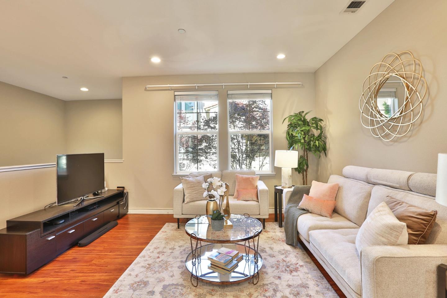 1105 Luz Del Sol Tr Loop Milpitas, CA 95035 - Photo 5 of 34 a living room with furniture and a flat screen tv