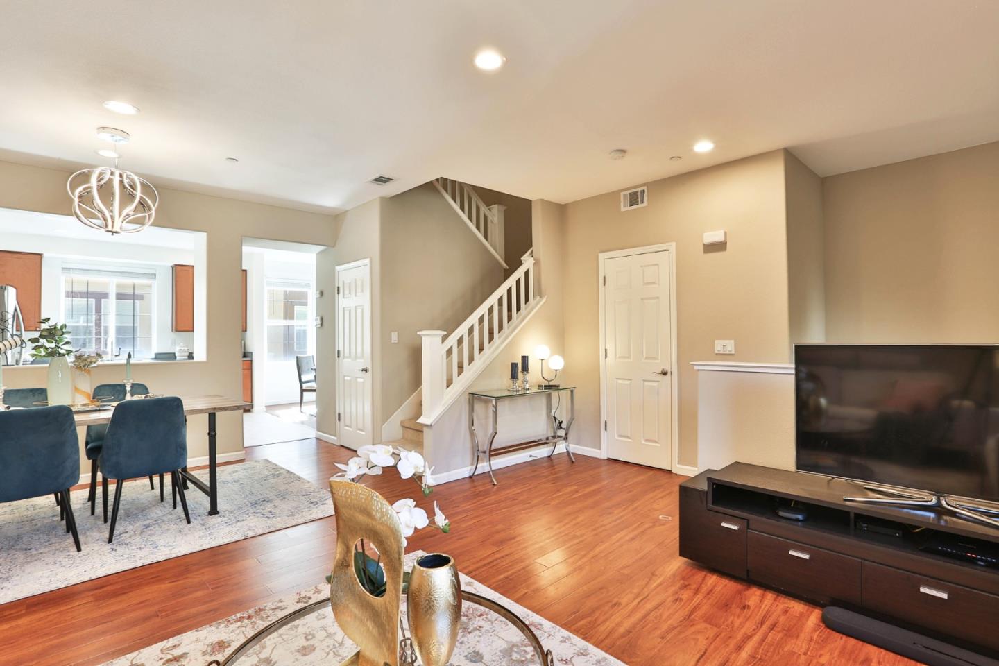 1105 Luz Del Sol Tr Loop Milpitas, CA 95035 - Photo 6 of 34 a living room with furniture and a flat screen tv
