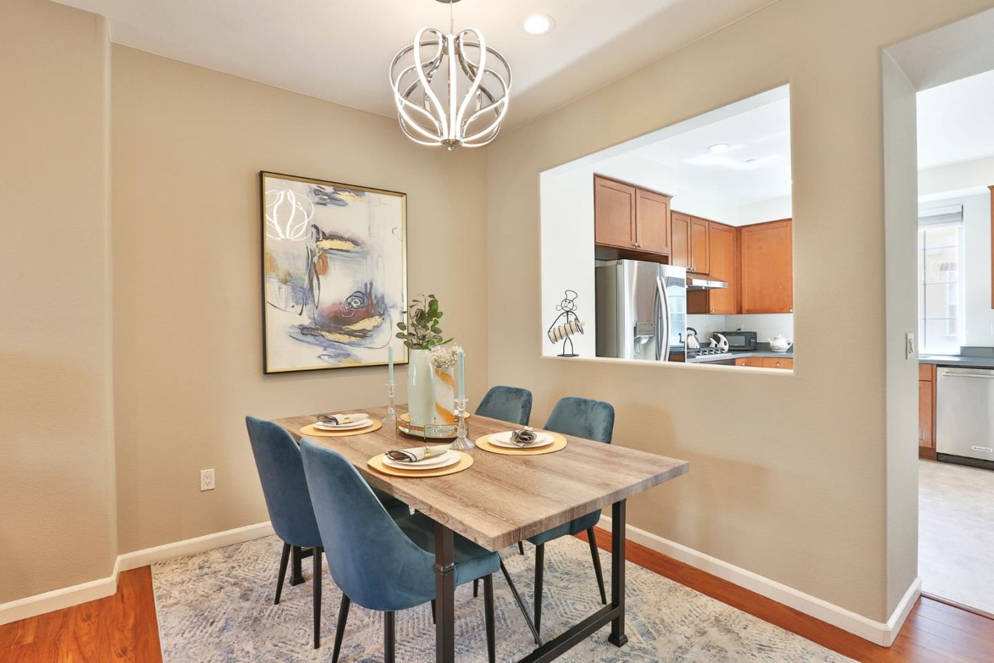 1105 Luz Del Sol Tr Loop Milpitas, CA 95035 - Photo 7 of 34 a view of a dining room with furniture window and wooden floor