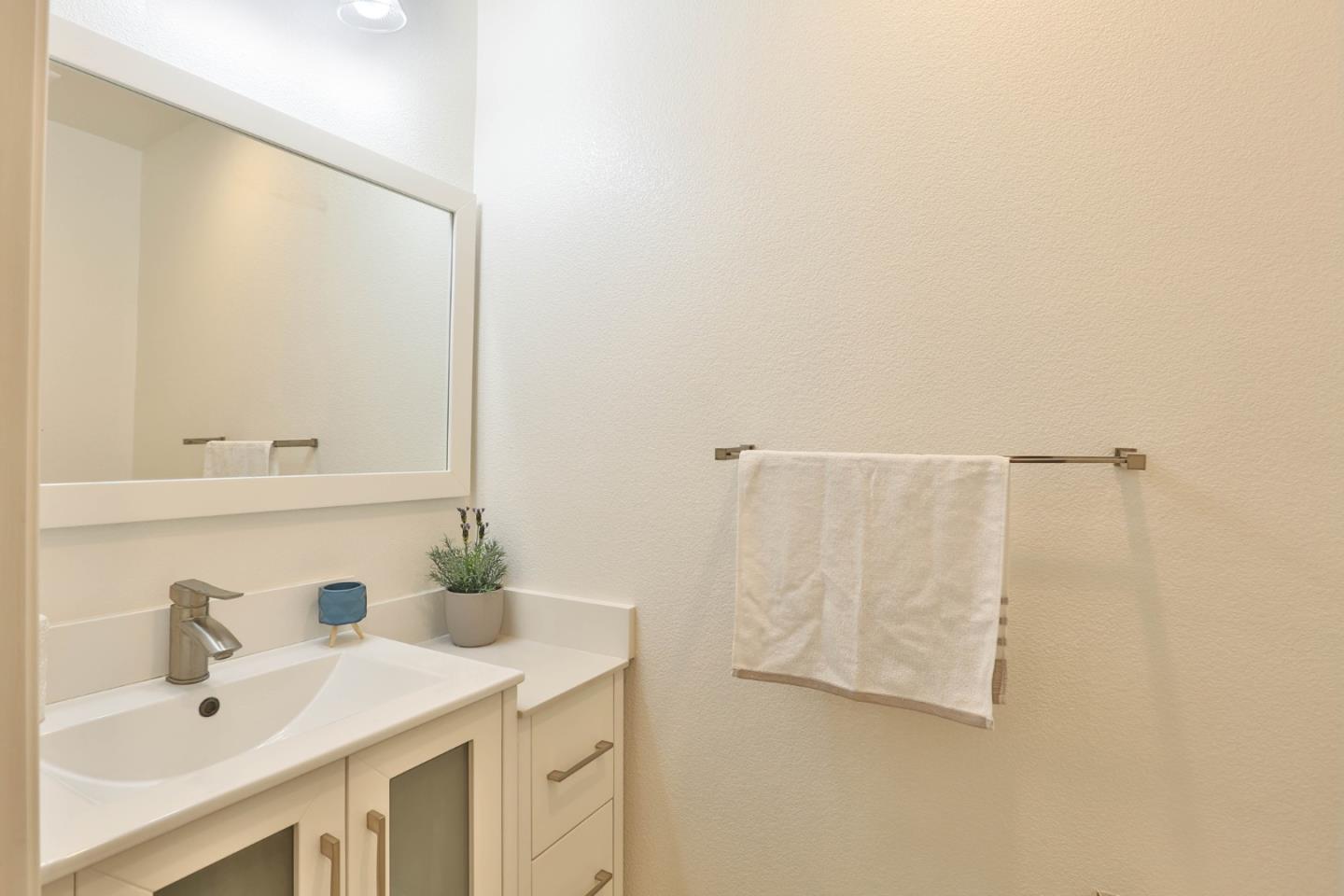 1105 Luz Del Sol Tr Loop Milpitas, CA 95035 - Photo 8 of 34 a bathroom with a sink and a mirror