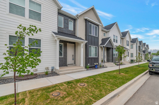 30 South Moonlit Road Mapleton, UT 84664 - Photo 2 of 25 Modern townhome exterior featuring an inviting covered porch
