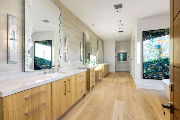 a roof deck with table and chairs