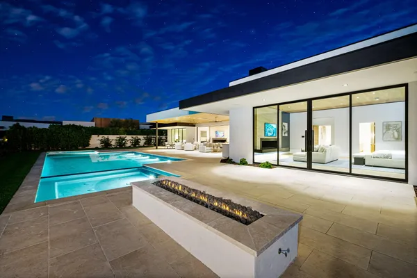 a bed room with a bed and a television