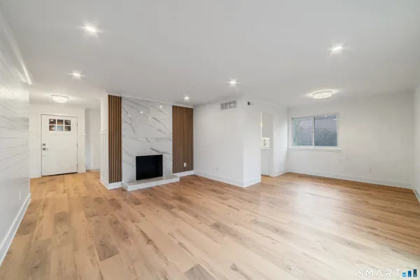 a view of a livingroom with a fireplace