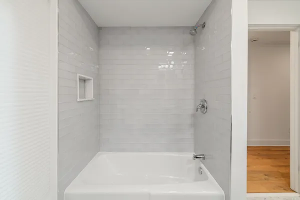a bathroom with a bathtub