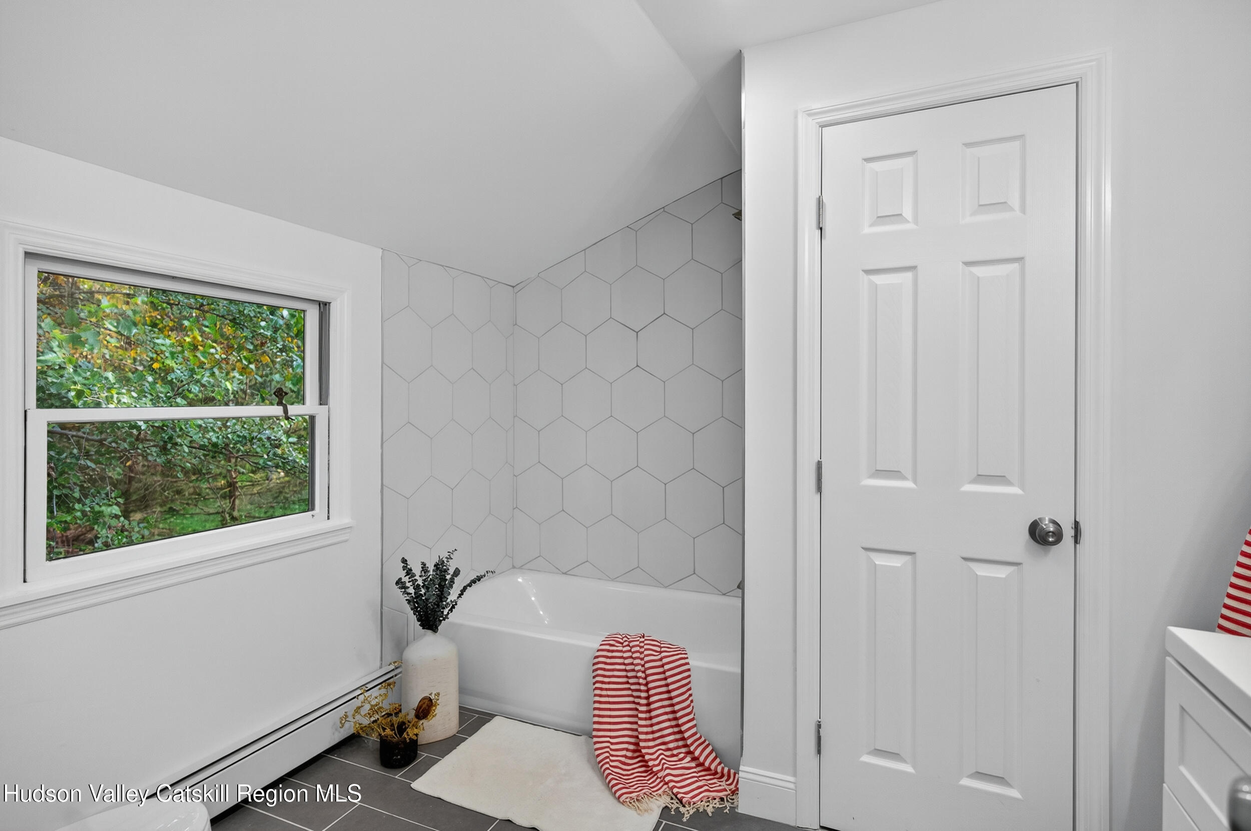 70 Fawn Road Saugerties, NY 12477 - Photo 20 of 30 a bathroom with a bathtub and shower