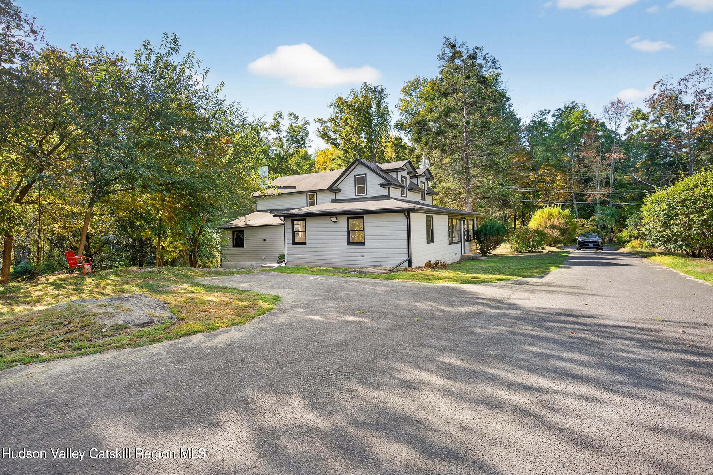 70 Fawn Road Saugerties, NY 12477 - Photo 2 of 30 a front view of a house with a yard and garage