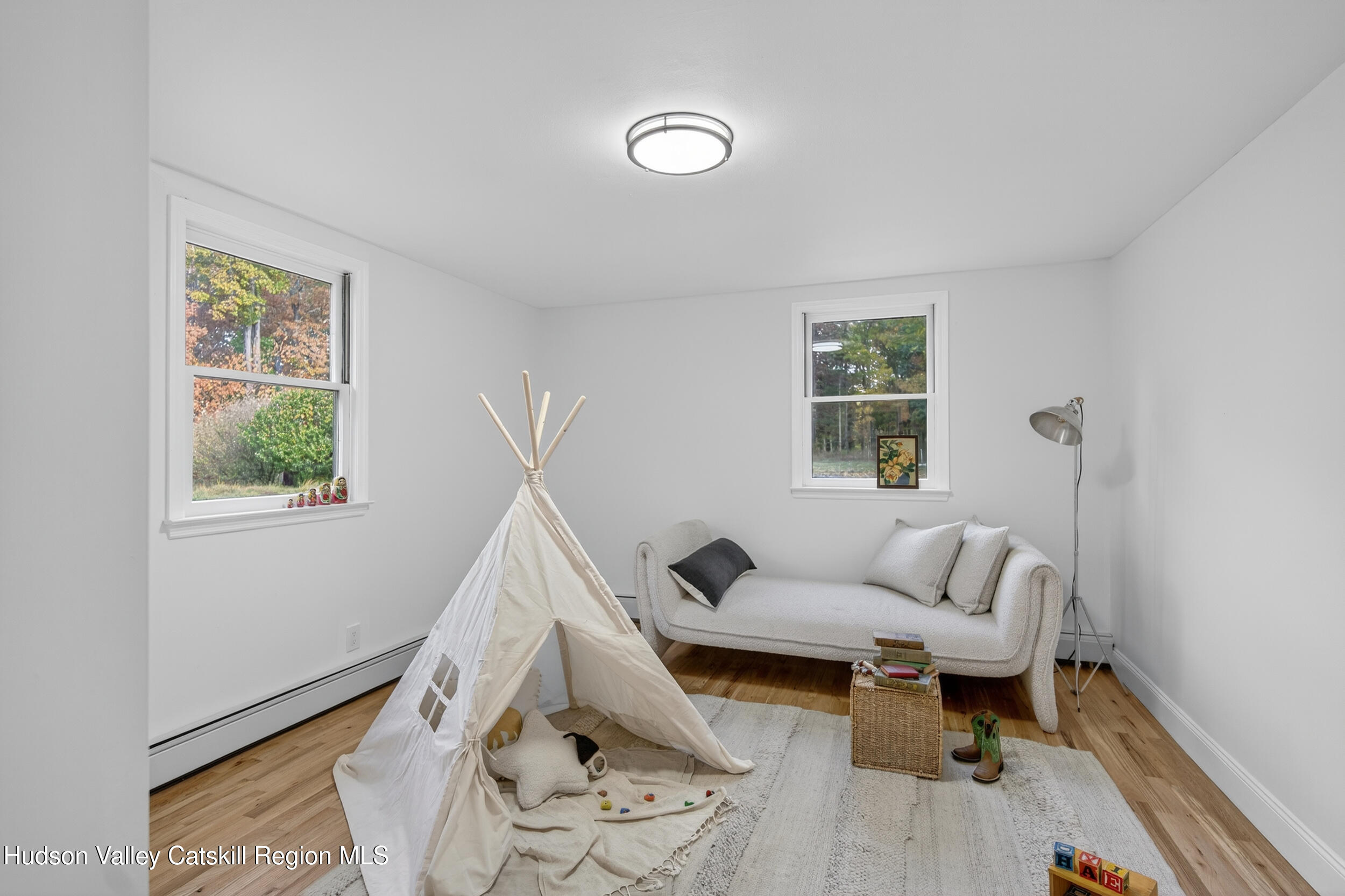 70 Fawn Road Saugerties, NY 12477 - Photo 22 of 30 a living room with furniture and a window