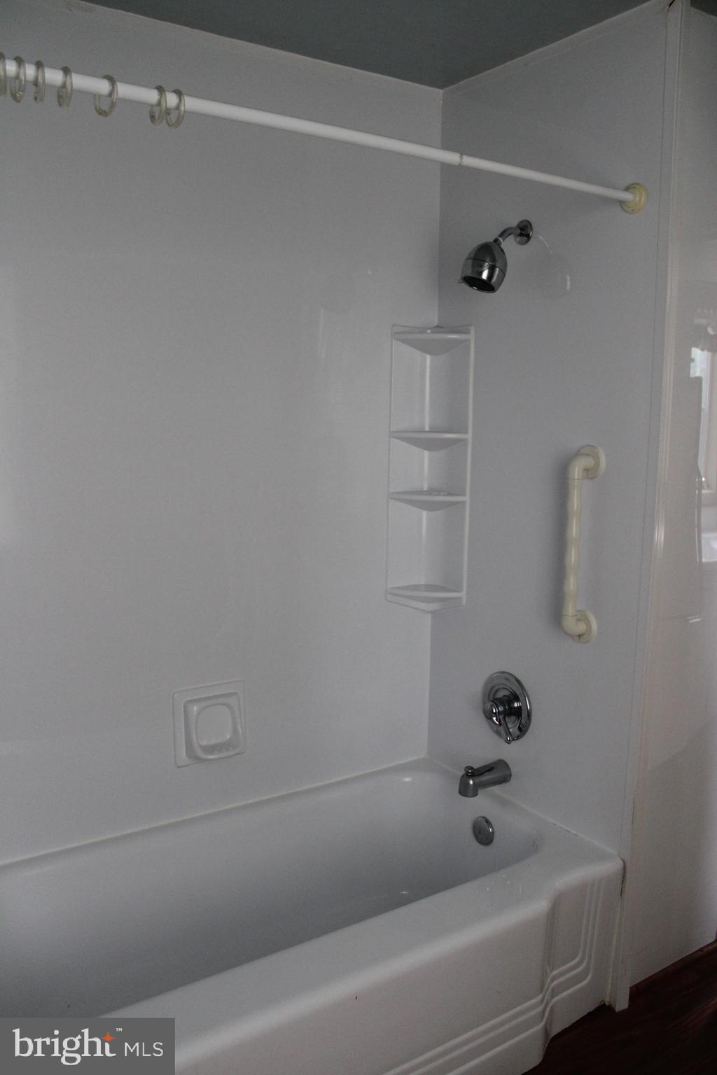 27 Valley Road York, PA 17407 - Photo 2 of 7 a bathroom with a bathtub and a shower