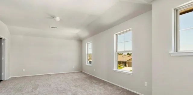 an empty room with windows