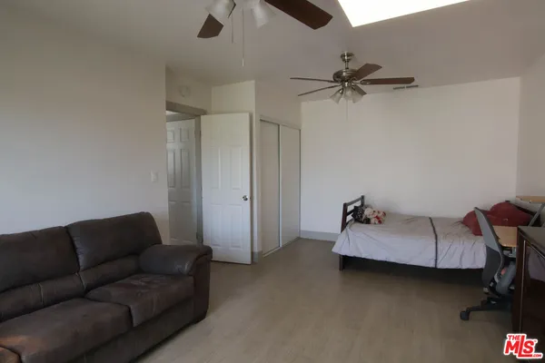 a living room with a flat screen tv