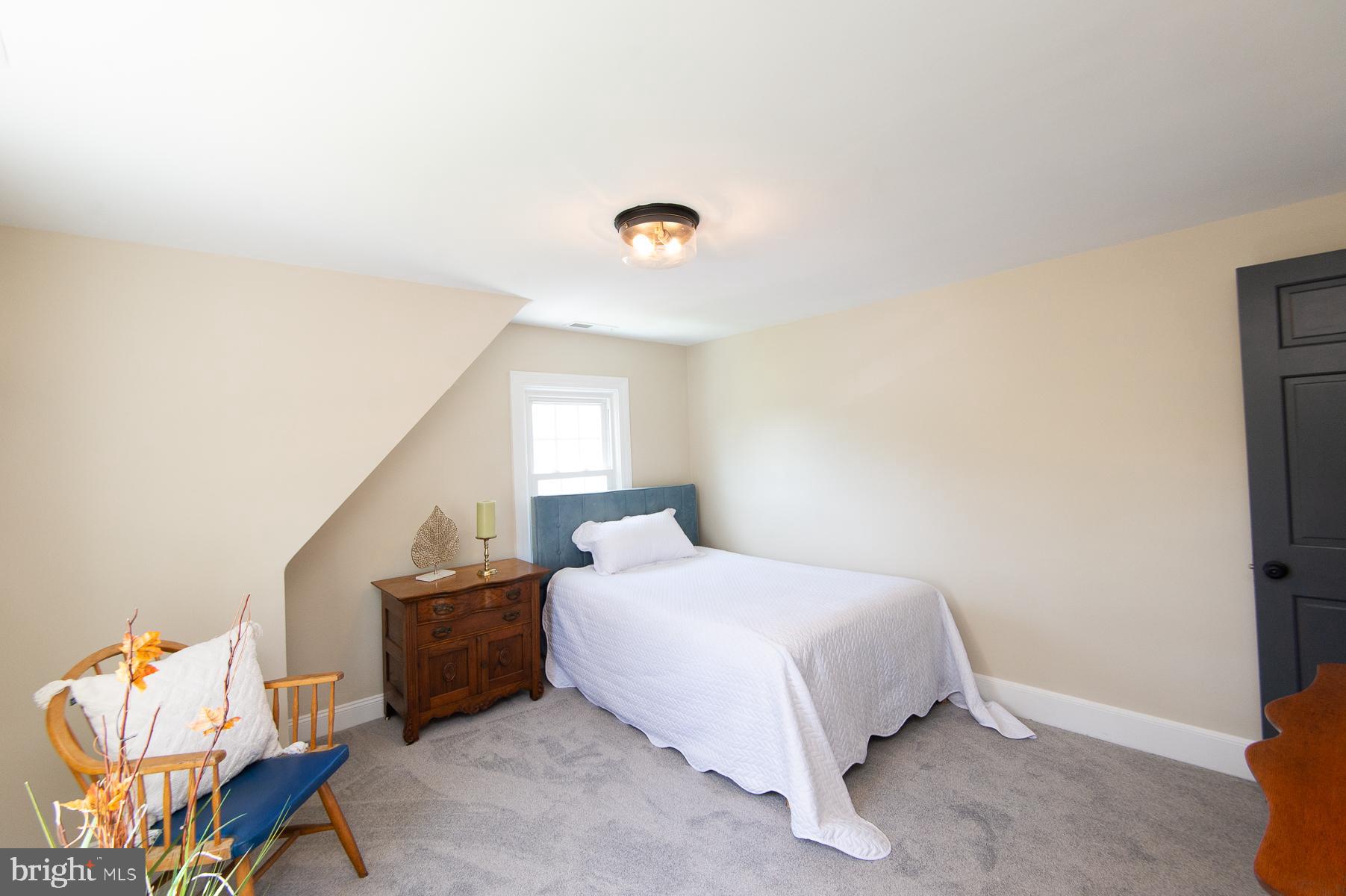 310 Talbot Avenue Cambridge, MD 21613 - Photo 25 of 68 a bedroom with a bed and a window