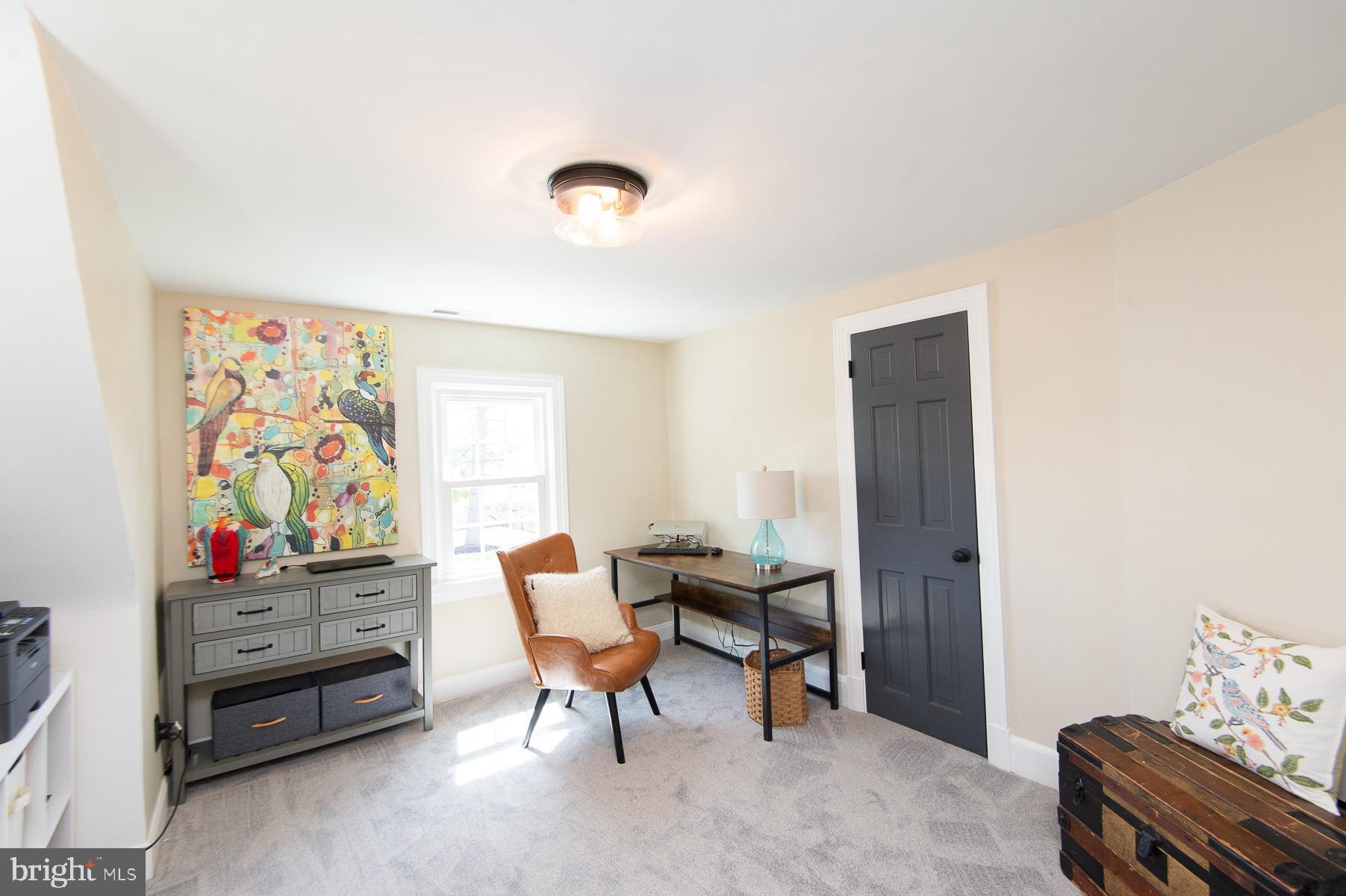 310 Talbot Avenue Cambridge, MD 21613 - Photo 28 of 72 a living room with furniture and a window