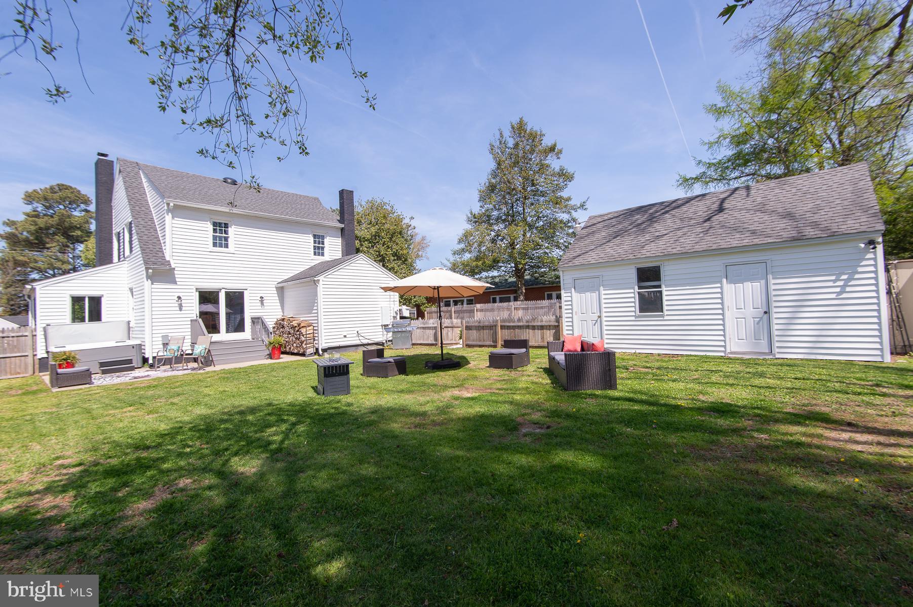 310 Talbot Avenue Cambridge, MD 21613 - Photo 43 of 72 a view of a house with a yard and sitting area