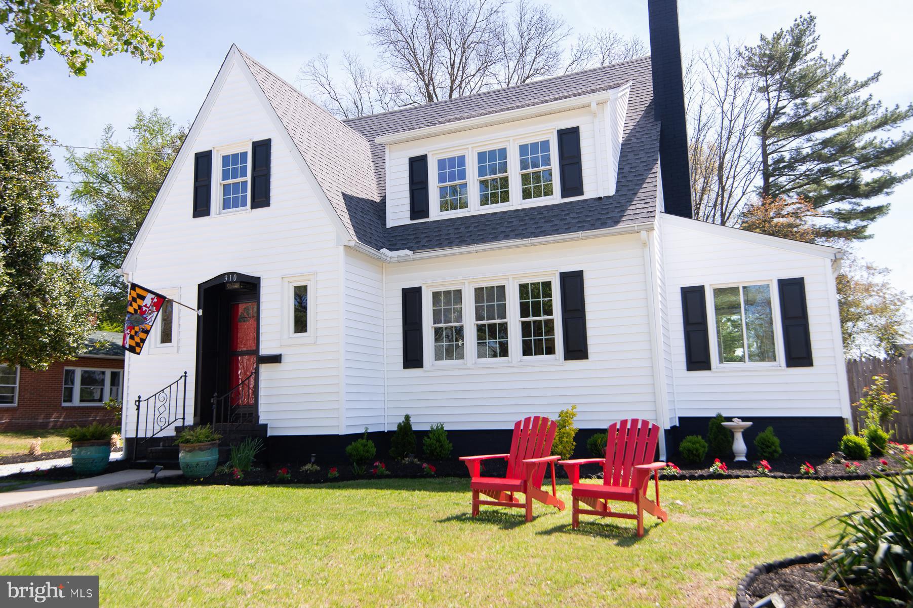 310 Talbot Avenue Cambridge, MD 21613 - Photo 65 of 68 a front view of house with yard and outdoor seating